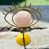 Rose Quartz Sphere in Gold Evil Eye Stand