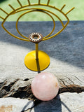 Rose Quartz Sphere in Gold Evil Eye Stand
