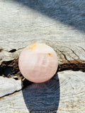 Rose Quartz Sphere in Gold Evil Eye Stand