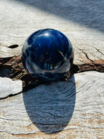 Sodalite Sphere with Black Evil Eye Stand